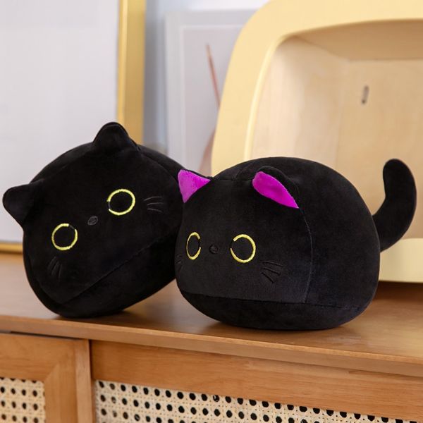 Schwarzes Katzen-Plüschtier & Cousins