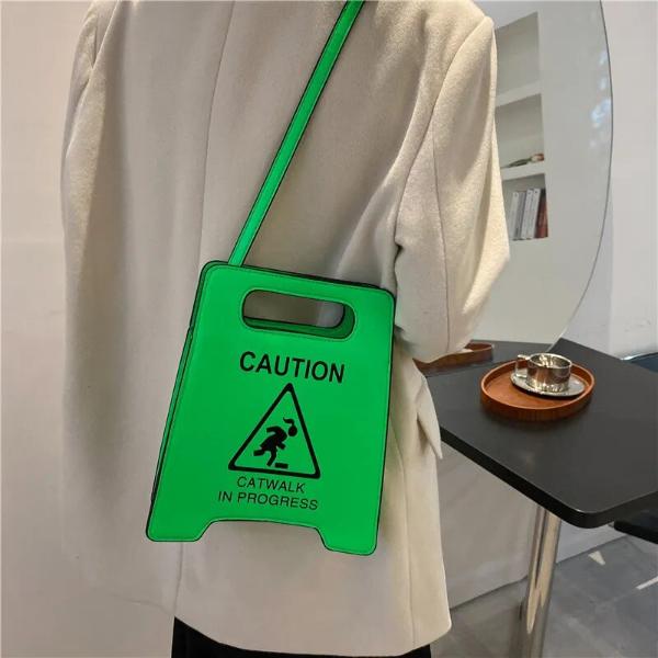 Neuartige Tragetasche mit Warnschild