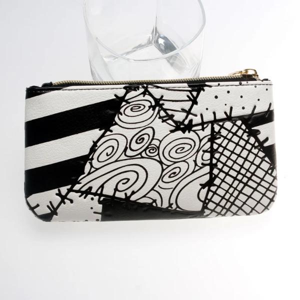 Clutch mit Totenkopf-Motiv 